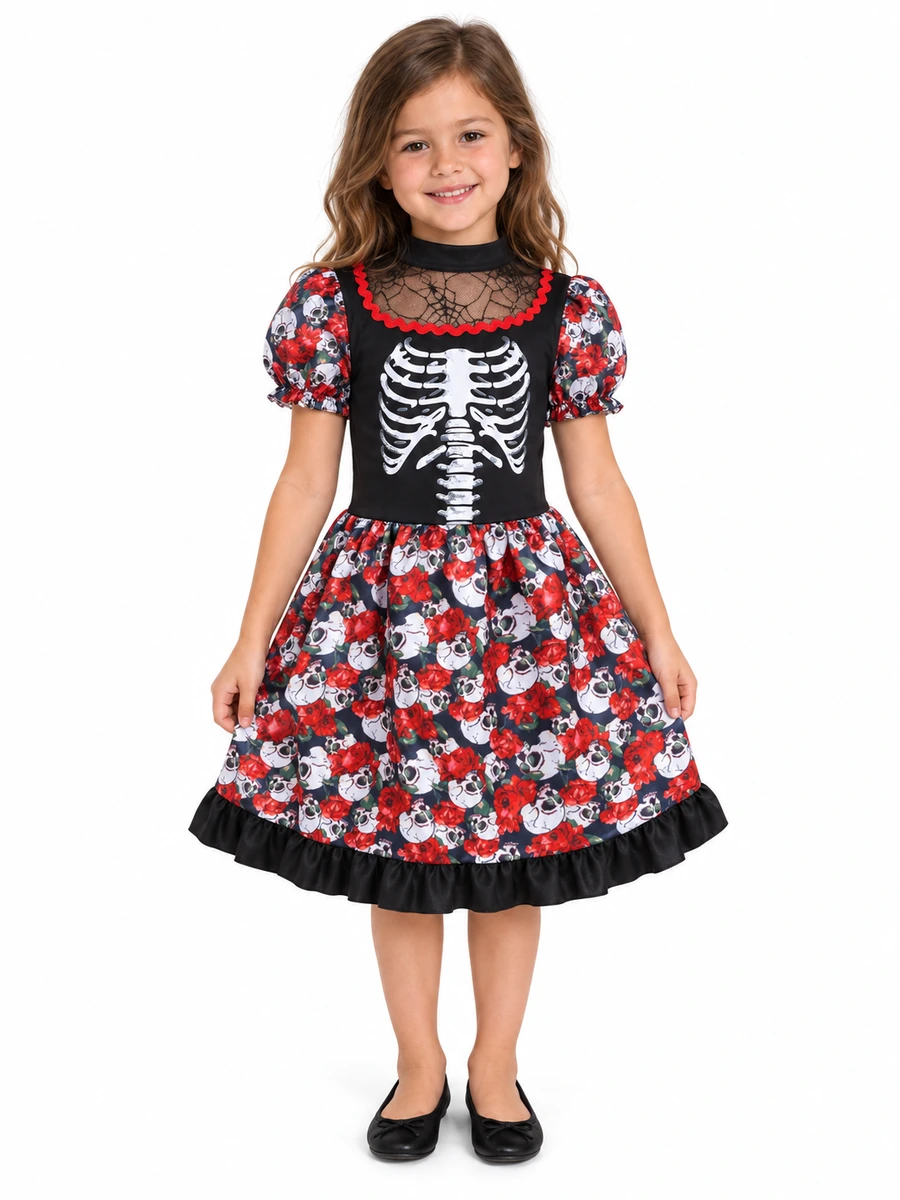 Bambina con il costume Katrina Bonita, abito nero con scheletro e gonna fantasia, vista frontale