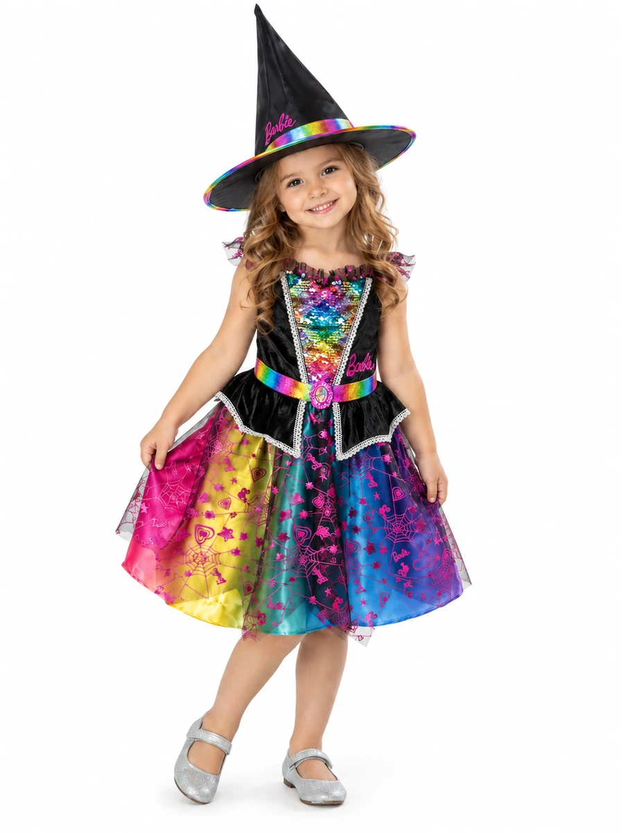 Bambina più piccola con costume Barbie da strega, corpetto con paillettes e gonna arcobaleno.